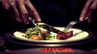 Hannibal's first appearance (eating) on the Hannibal series | Image via: Netflix | Edited by: Beatrix Kondo of Soap Central
